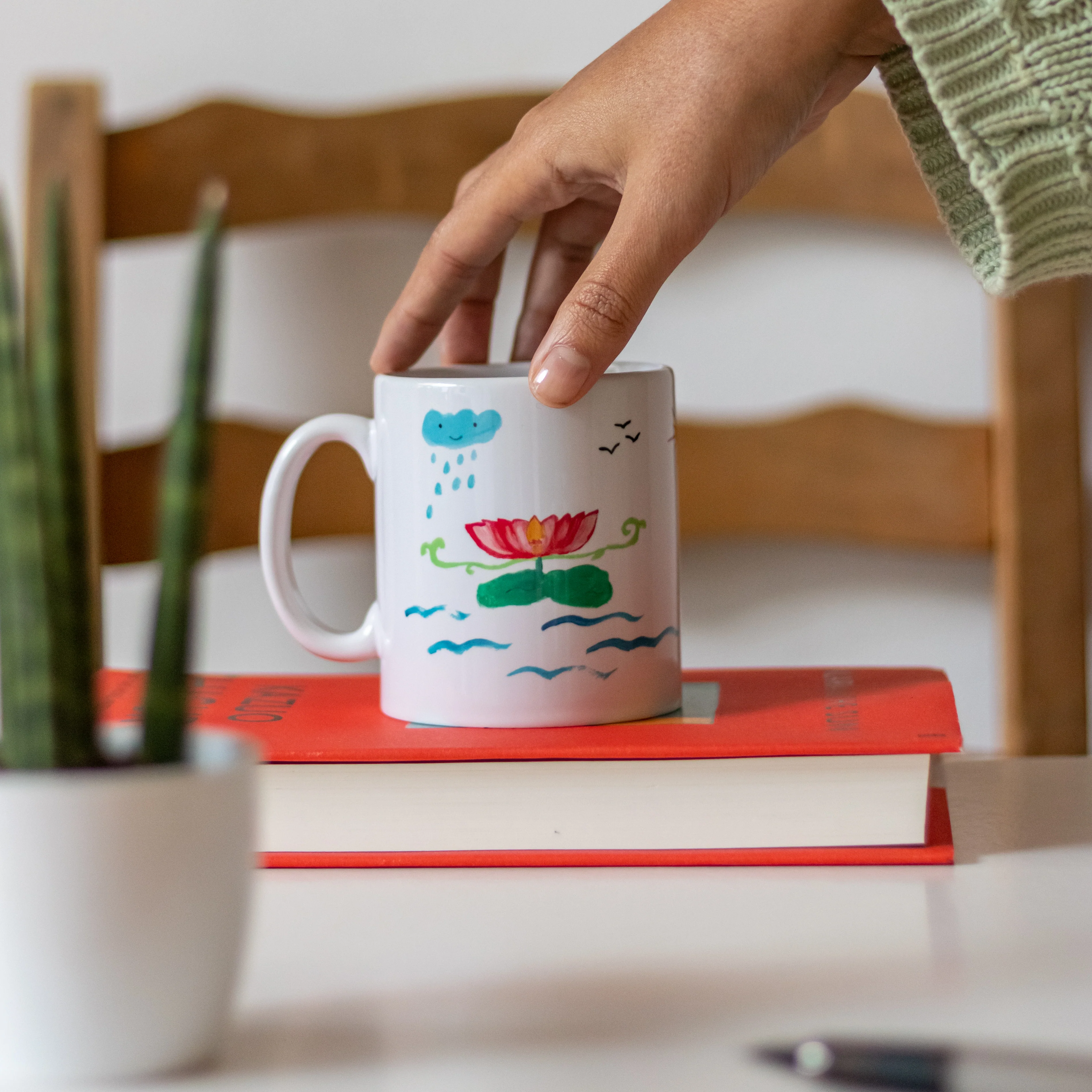 Designed by Refugees Lotus Flower Coffee Mug - Image 3