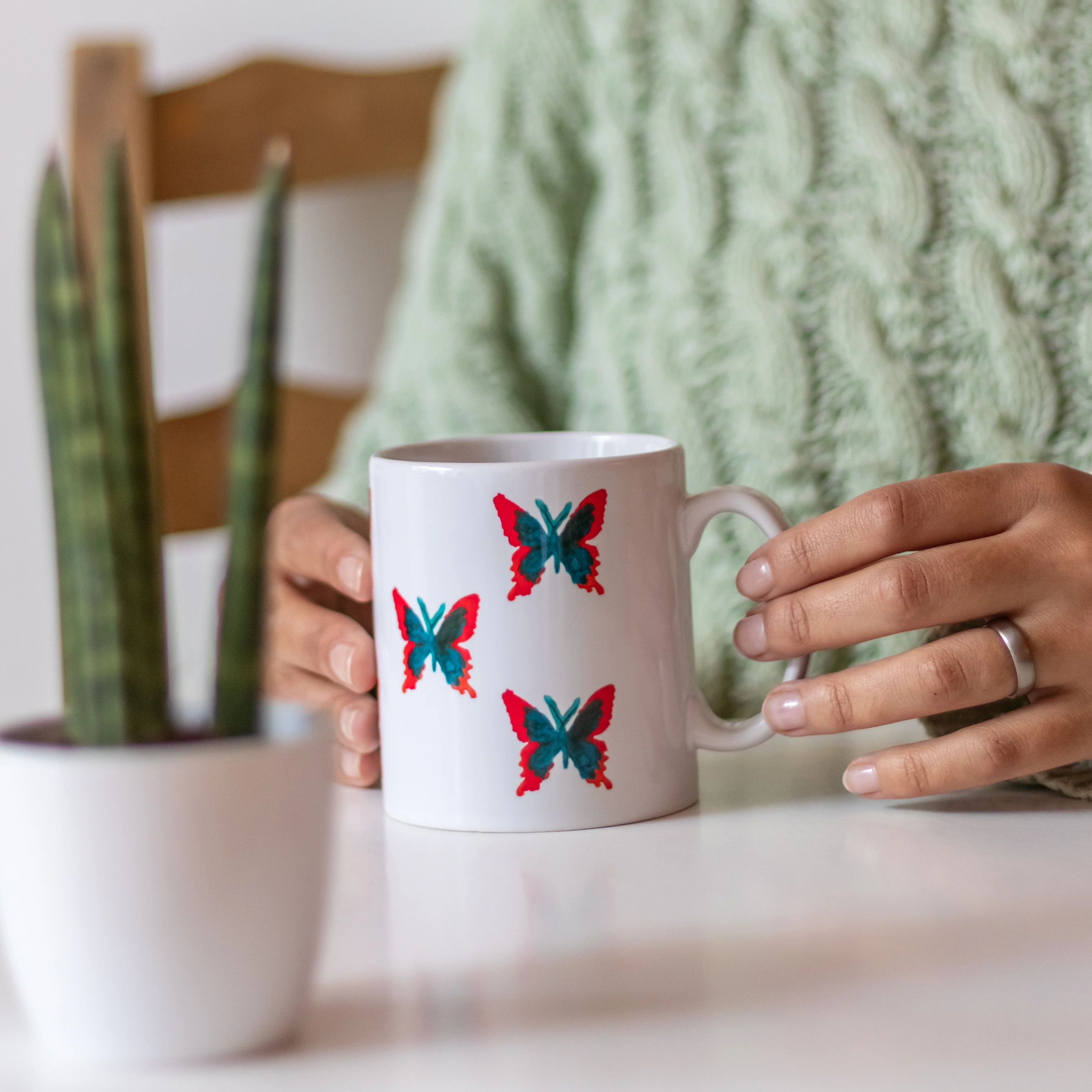 Designed by Refugees Butterfly Print Coffee Mug - Image 3
