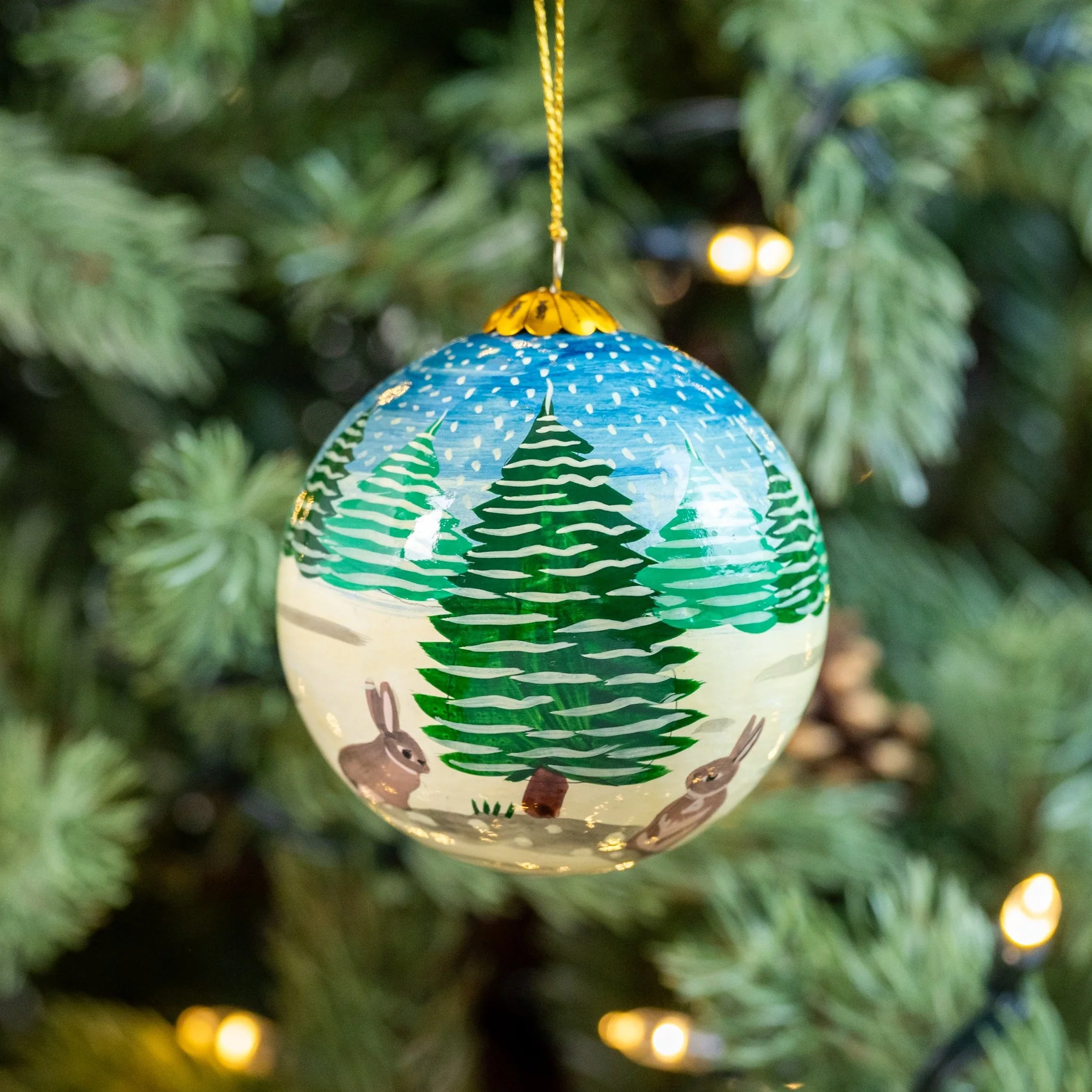 Snow Bunnies Hand Painted Christmas Bauble | British Red Cross Shop - Image 2